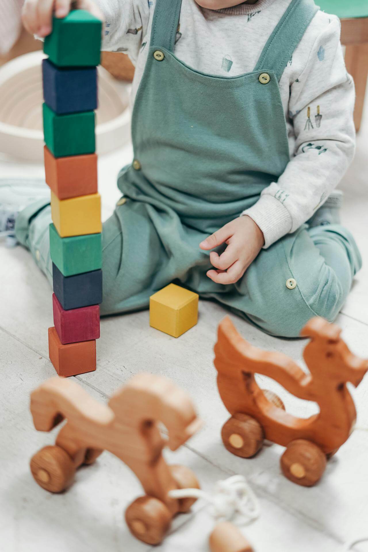 child playing with blocks at a daycare center child playing with blocks at a daycare center
