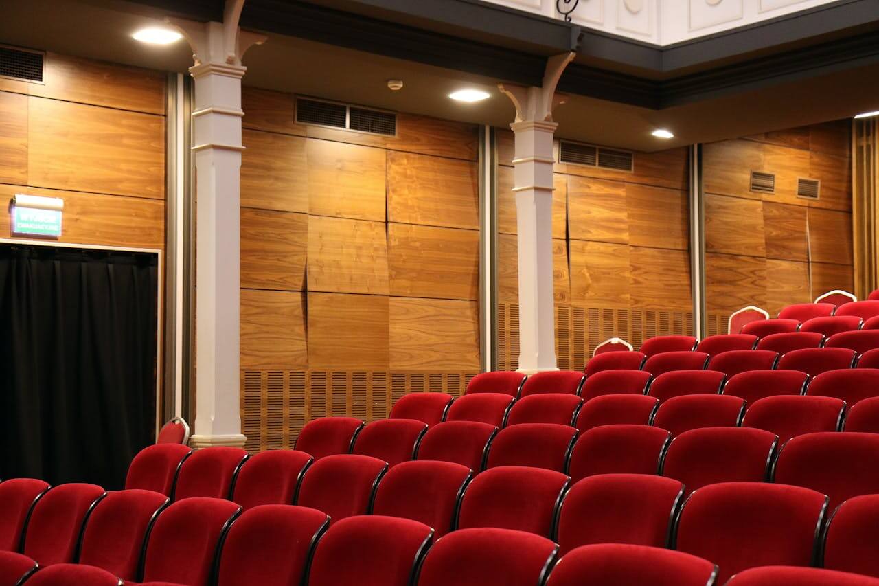 cinema interior with red chairs cinema interior with red chairs