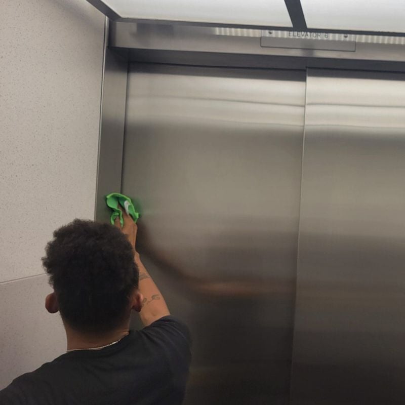 Cleaning elevator in office building in Dallas Fort Wroth Metroplex Cleaning elevator in office building in Dallas Fort Wroth Metroplex