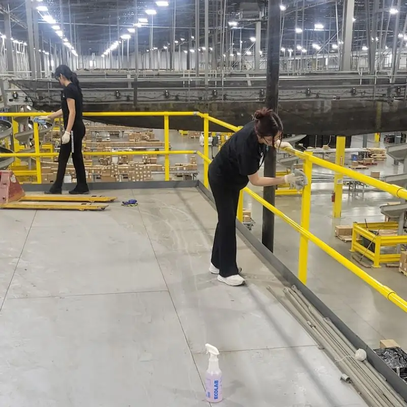 Cleaning guard rails in warehouse and distribution center