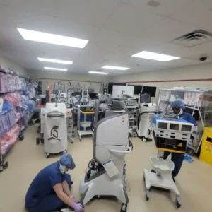 Cleaning wheels on medical equipment in Dallas Hospital
