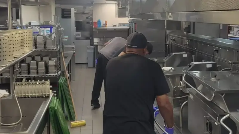 Professional cleaners deep cleaning commercial kitchen in Dallas Fort Worth - Restaurant cleaning services