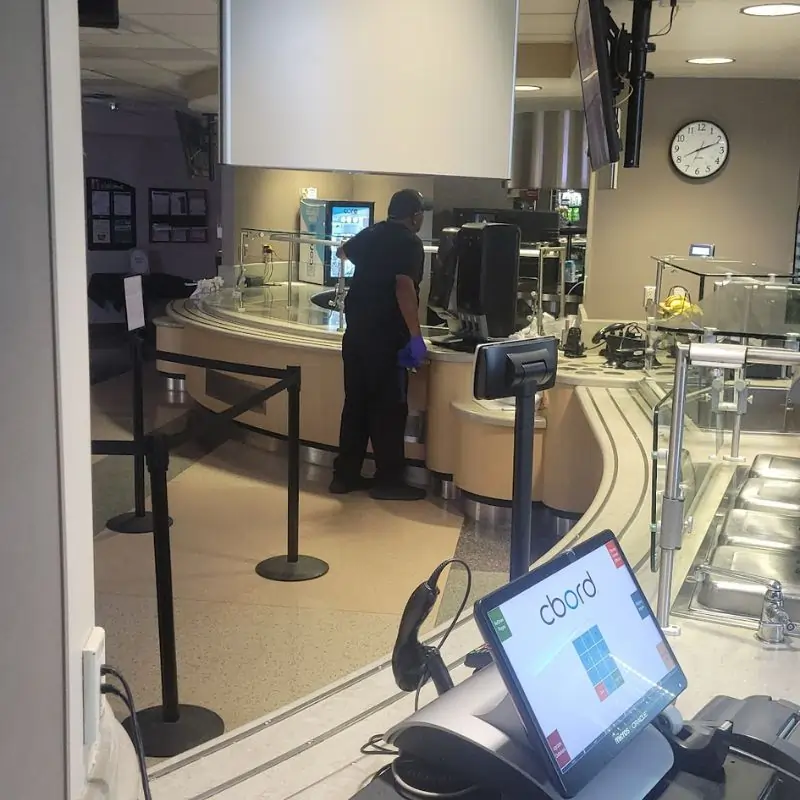 Day porter checking canteen and breakroom, removes trash, and cleaning surfaces Day porter checking canteen and breakroom, removes trash, and cleaning surfaces