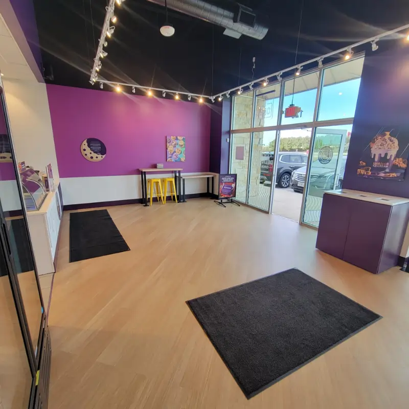 Retail store in Cedar Hill after cleaning floors, counters, chairs, desks, and waste bins