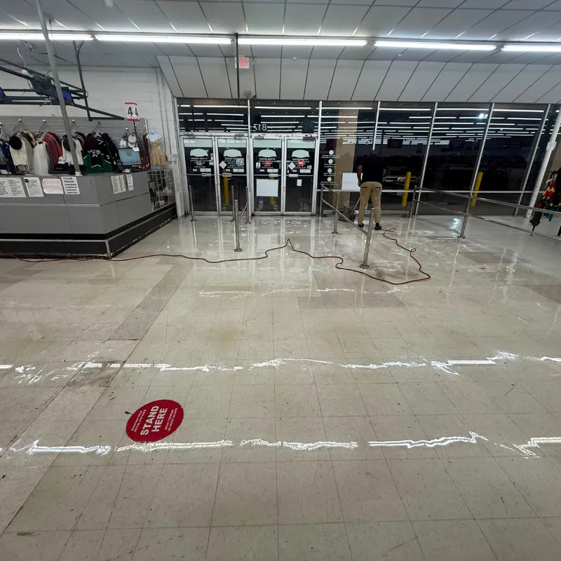 After - Completed full strip and wax of 12,000 sq ft VCT floors in Family Thrift Store in Arlington TX