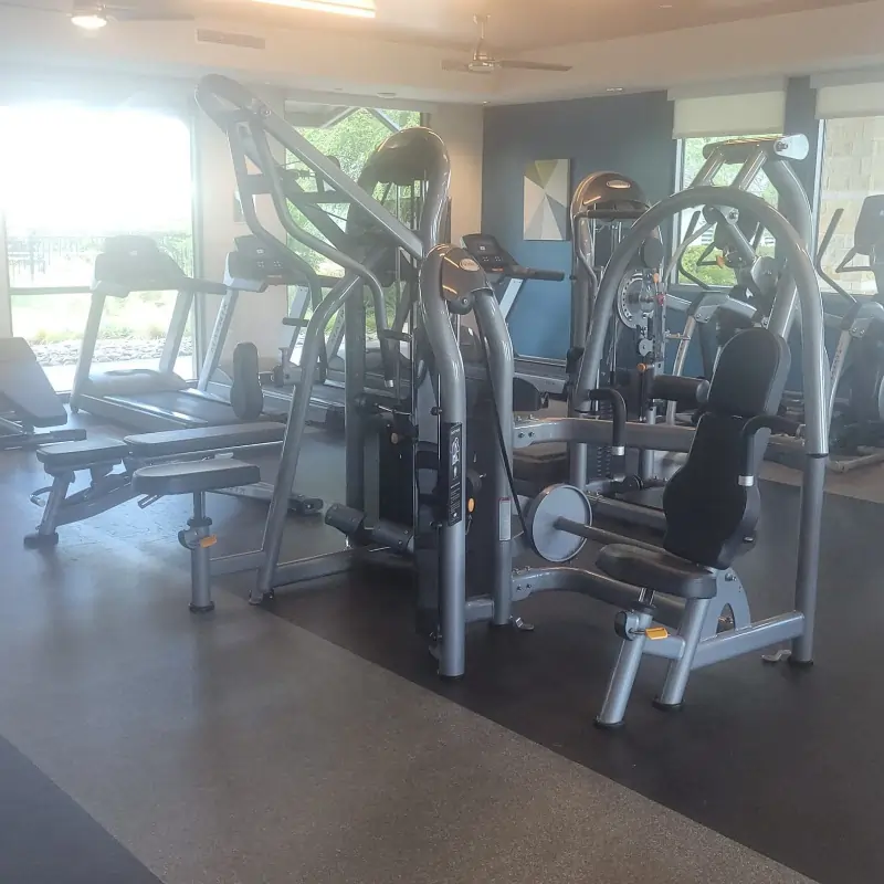 After picture - completed cleaning and disinfection of fitness center equipments, rubber floors, and windows in Arlington Fitness center