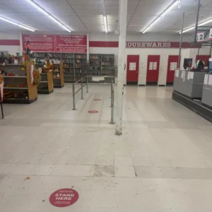Before - Full strip and wax of 12,000 sq ft VCT floors in Family Thrift Store in Arlington TX