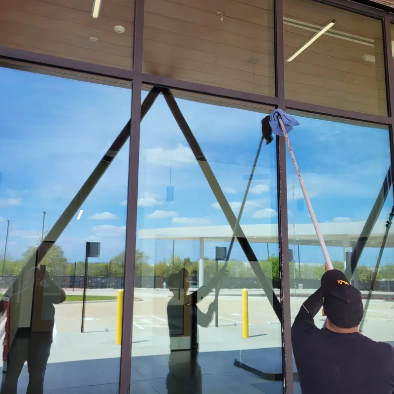 Craddock's cleaning tall window facade a entertainment and play ground facility