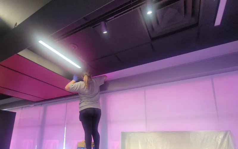 High dusting ceiling cleaning air-vents post-renovation of T-Mobile retail store in DeSoto TX